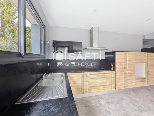 Maison d’architecte avec beaux volumes proche bourg