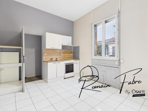 Immeuble avec espace garage et logements « Coeur de Bordeaux »