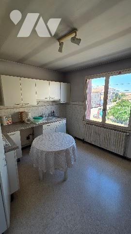 Immeuble (local commercial + appartement)