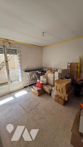 Immeuble (local commercial + appartement)