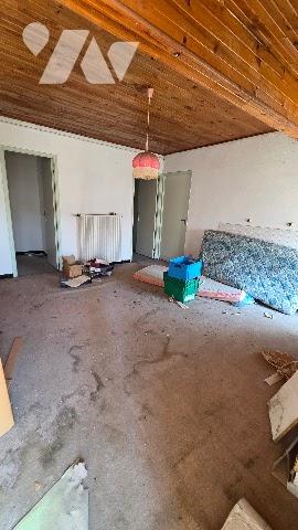 Immeuble (local commercial + appartement)