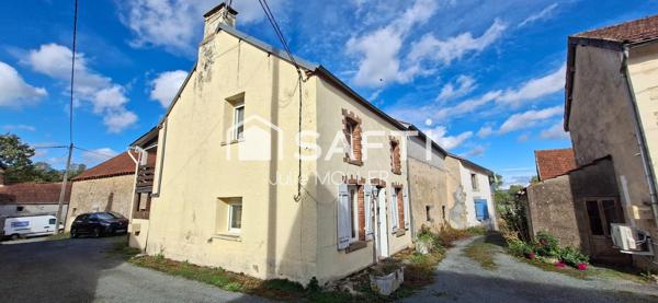 Maison avec 2 espaces de vie et terrasses à Anzême