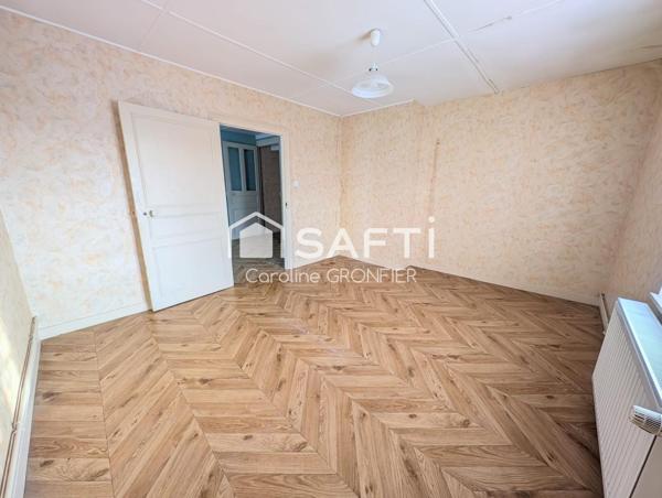 Maison élevée sur cave avec jardin – Proche commodités