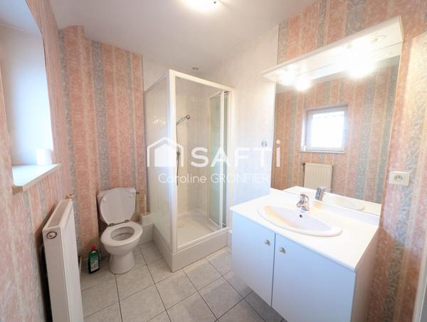 Maison élevée sur cave avec jardin – Proche commodités