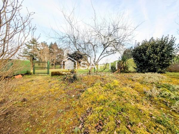 Maison élevée sur cave avec jardin – Proche commodités