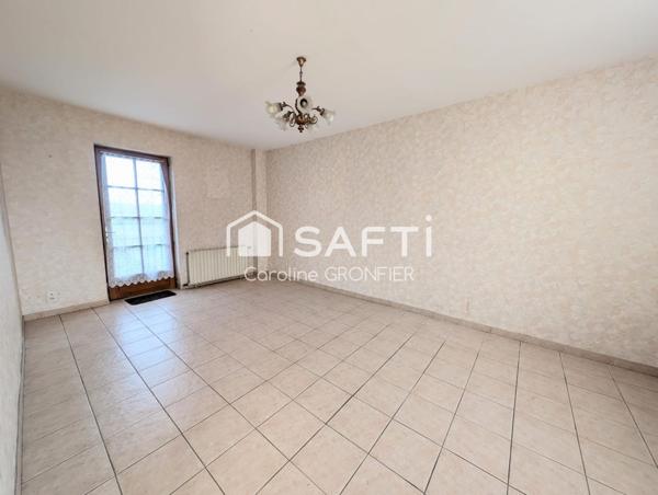 Maison élevée sur cave avec jardin – Proche commodités