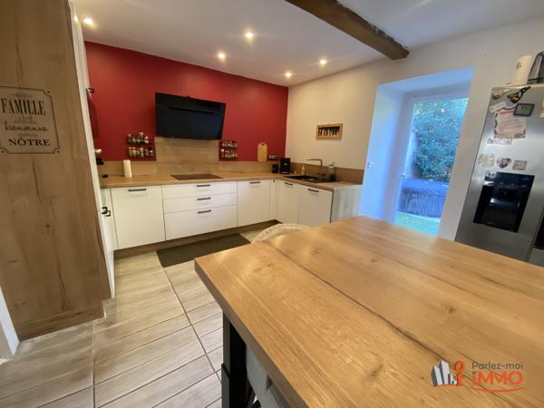 Exclusivité – Charmante maison mitoyenne de 157 m² avec grand terrain à Vaulx-Milieu