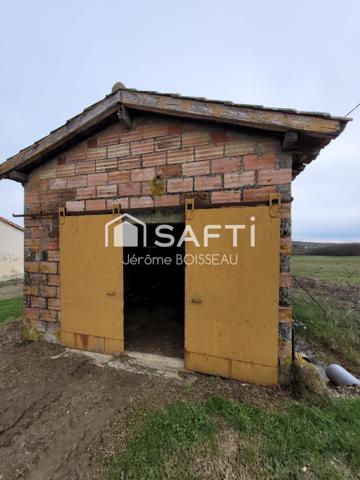 sur un terrain de 3000 m2 maison et grange