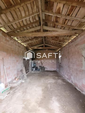 sur un terrain de 3000 m2 maison et grange