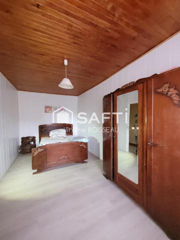 sur un terrain de 3000 m2 maison et grange