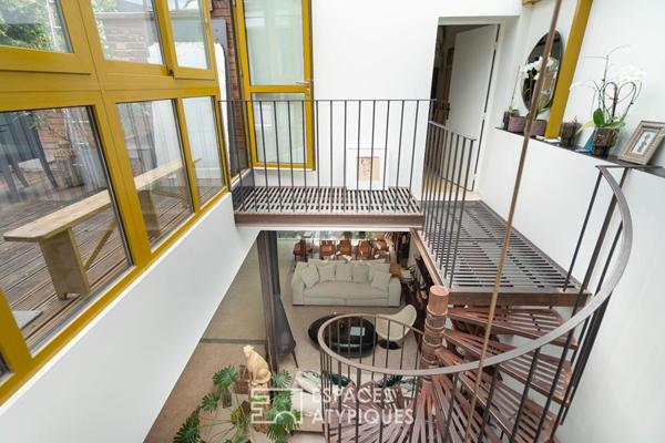 Loft avec piscine intérieure et appartements à usage mixte