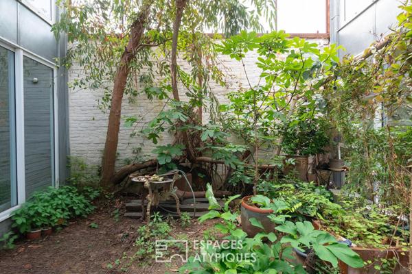 Loft avec piscine intérieure et appartements à usage mixte