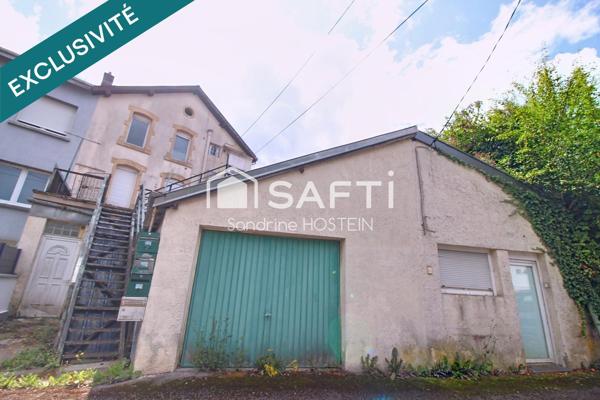 Immeuble avec 5 appartements et 1 garage!