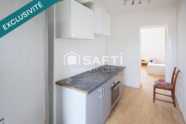 Immeuble avec 5 appartements et 1 garage!