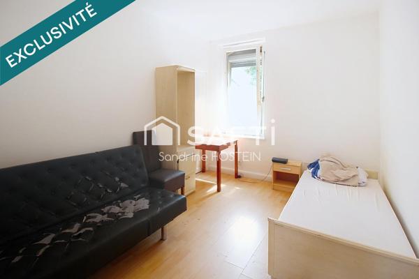 Immeuble avec 5 appartements et 1 garage!