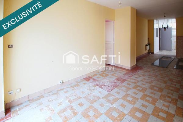 Immeuble avec 5 appartements et 1 garage!
