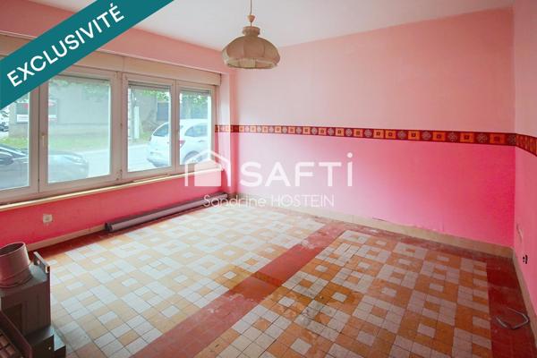 Immeuble avec 5 appartements et 1 garage!