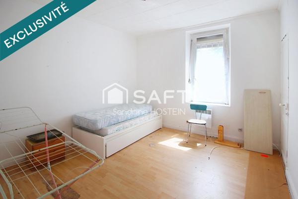Immeuble avec 5 appartements et 1 garage!