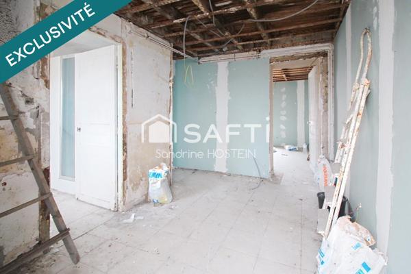Immeuble avec 5 appartements et 1 garage!