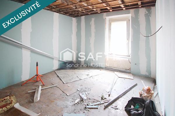 Immeuble avec 5 appartements et 1 garage!