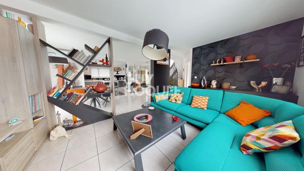 Maison spacieuse à vendre à Thann - 5 chambres et jardin