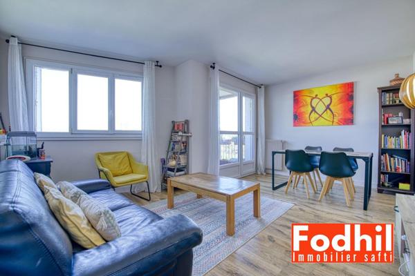 Appartement 4 pièces de 75 m² avec cave et parking en sous-sol.