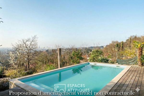 Maison ossature bois avec vue et piscine