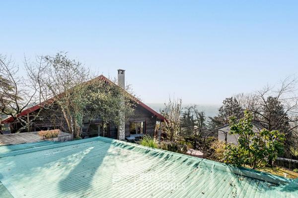 Maison ossature bois avec vue et piscine