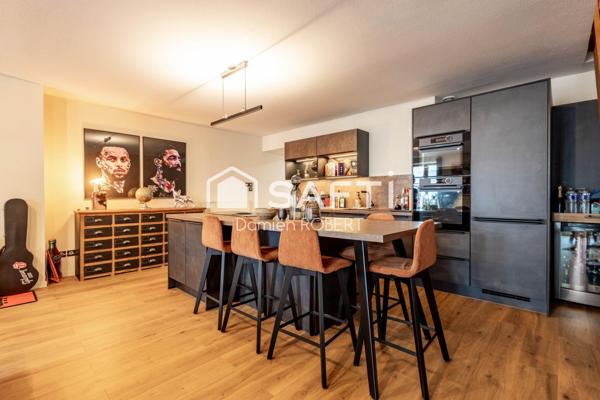 GRANDE APPARTEMENT AU CENTRE DU VILLAGE