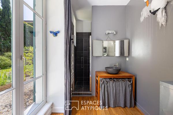 Appartement de plein pied avec jardin dans une ancienne bâtisse