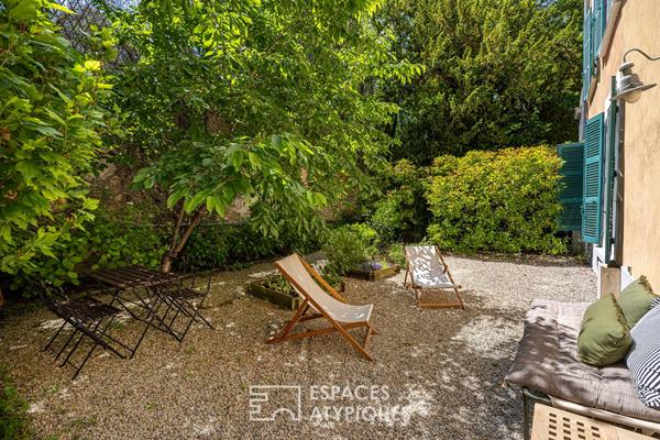 Appartement de plein pied avec jardin dans une ancienne bâtisse