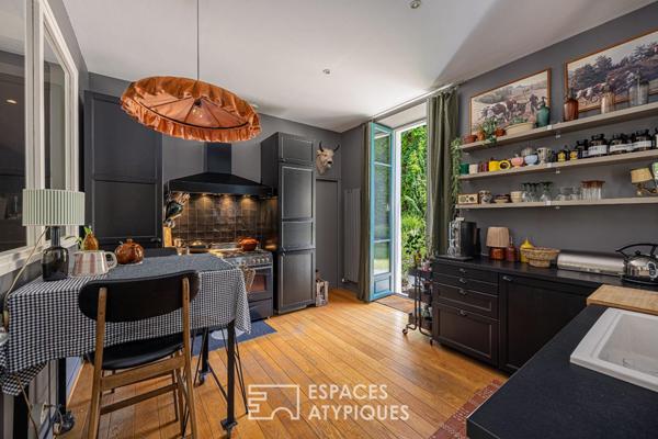 Appartement de plein pied avec jardin dans une ancienne bâtisse