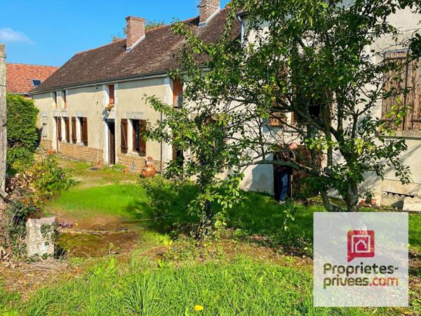 Maison à rénover avec potentiel de projets différents posée sur une terrain de 1000m²