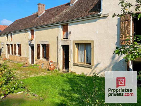 Maison à rénover avec potentiel de projets différents posée sur une terrain de 1000m²