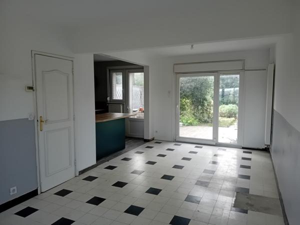 Maison semi individuelle avec jardin et garage