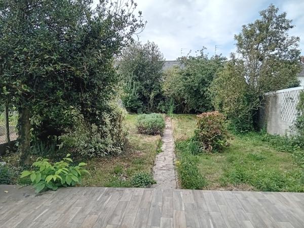Maison semi individuelle avec jardin et garage