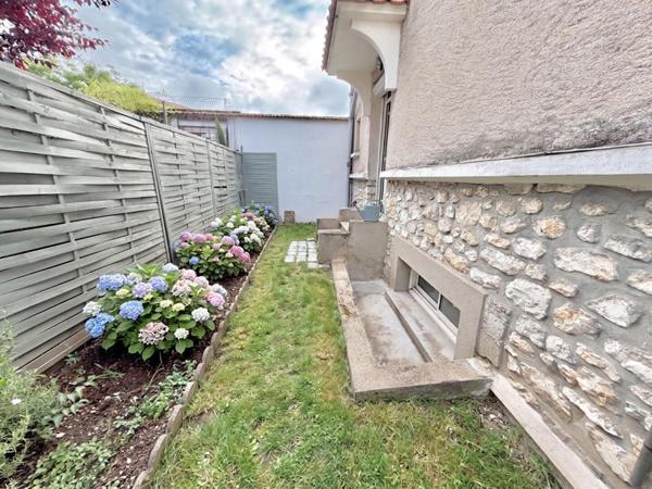 Maison centre-ville avec 3 chambres, jardinet et garage