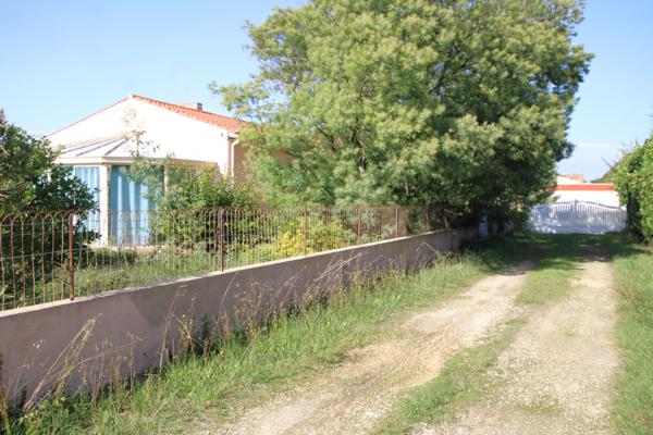 Plain pied non mitoyen sur un terrain de 1385 m²