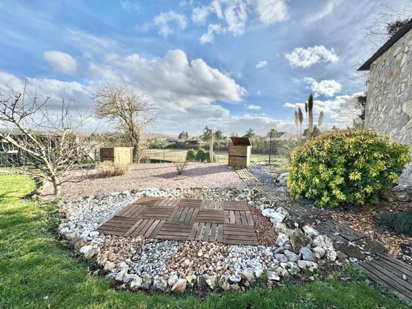 Maison 3 chambres avec sous-sol total et 2 garages
