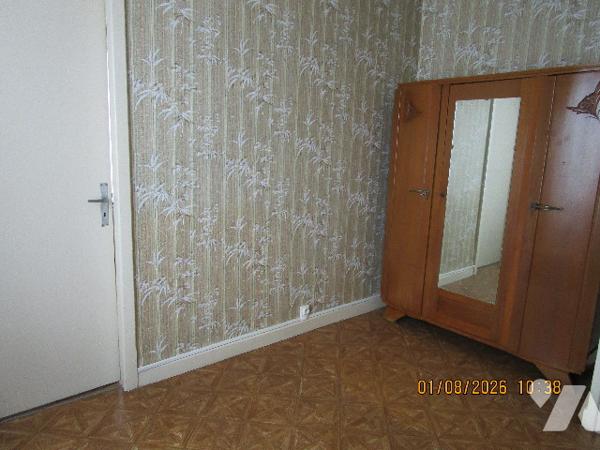 Proche centre ville : Maison sur sous-sol composée de 7 pièces avec terrain attenant de 5 a 14 ca