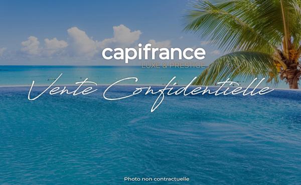 SAINT-FRANÇOIS – VILLA D'ARCHITECTE AVEC VUE MER, 4 SUITES ET RENTABILITÉ TOURISTIQUE REMARQUABLE