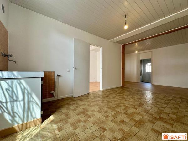 Appartement en rez-de-chaussée avec garage