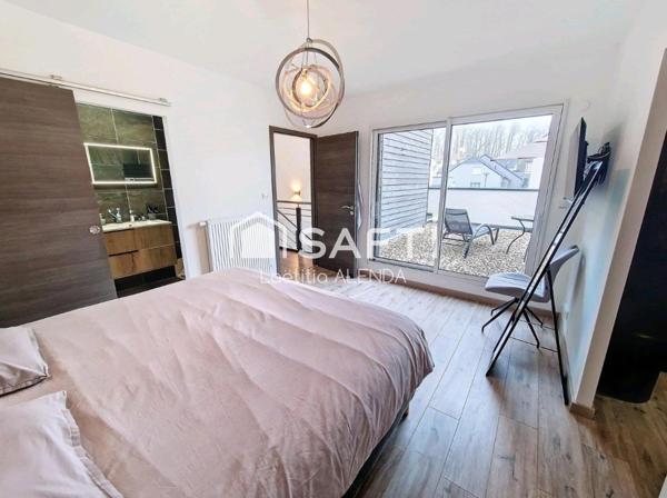 Maison individuelle de 155m2 avec prestations de qualité, double garage et jacuzzi