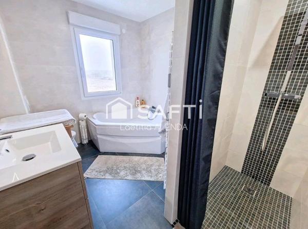 Maison individuelle de 155m2 avec prestations de qualité, double garage et jacuzzi