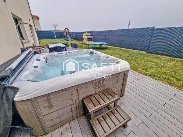 Maison individuelle de 155m2 avec prestations de qualité, double garage et jacuzzi
