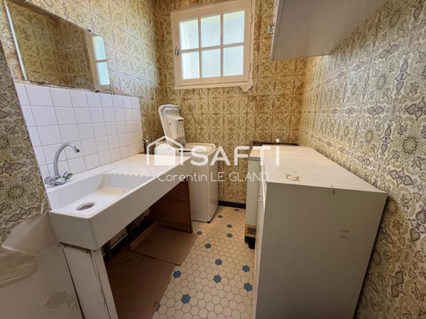 Maison proche centre avec beau potentiel