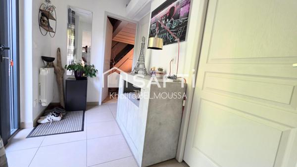 À découvrir en plein cœur d'Aix-les-Bains : charmante maison de plain-pied avec jardin arboré