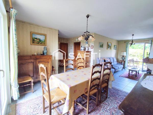 Maison individuelle sur demi niveau avec garage et grand jardin