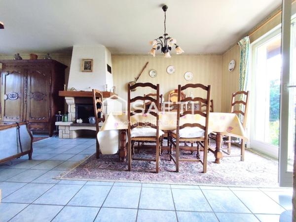 Maison individuelle sur demi niveau avec garage et grand jardin