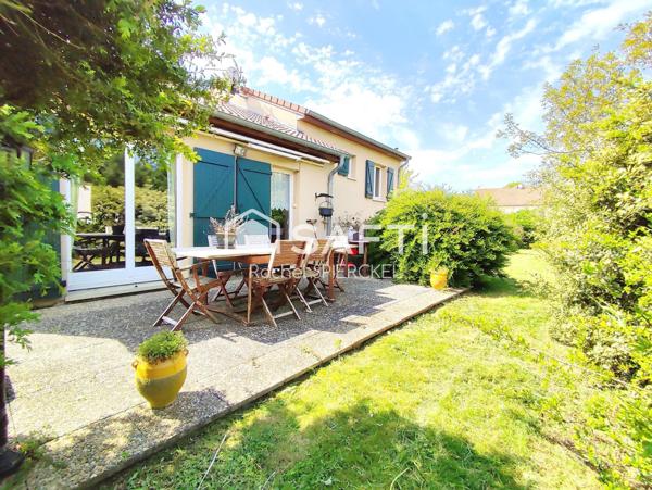Maison individuelle sur demi niveau avec garage et grand jardin